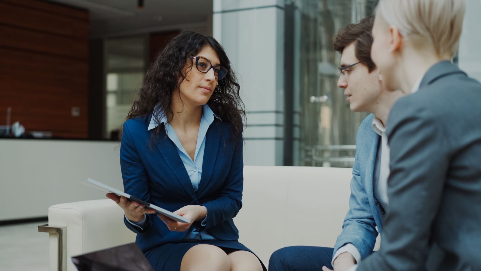 Business owner and IT consultant reviewing a technology strategy in a Calgary office