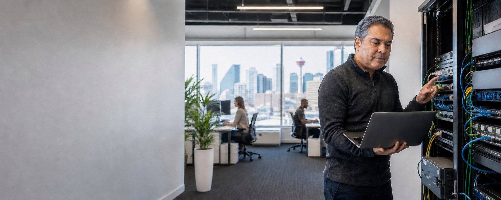 Calgary IT engineer working with business network infrastructure